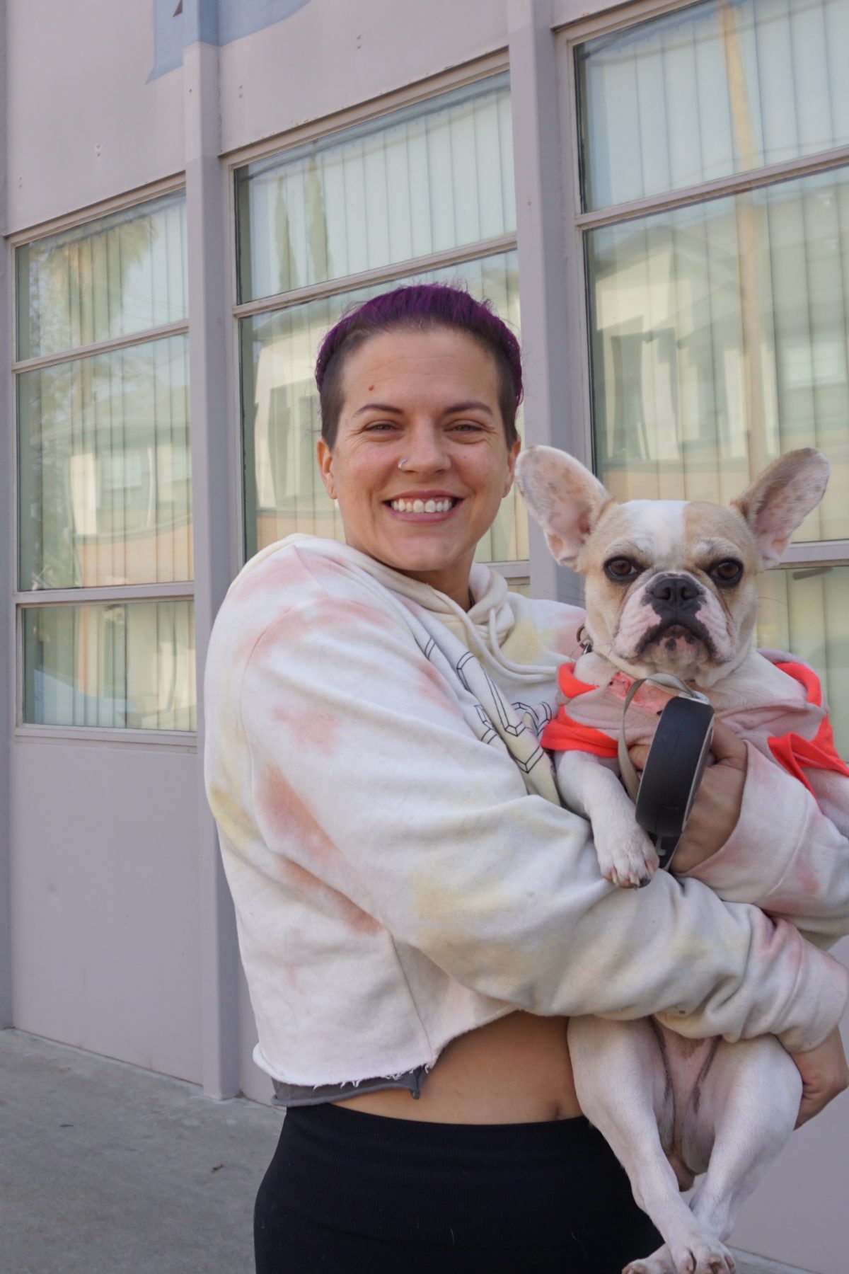 woman holding dog