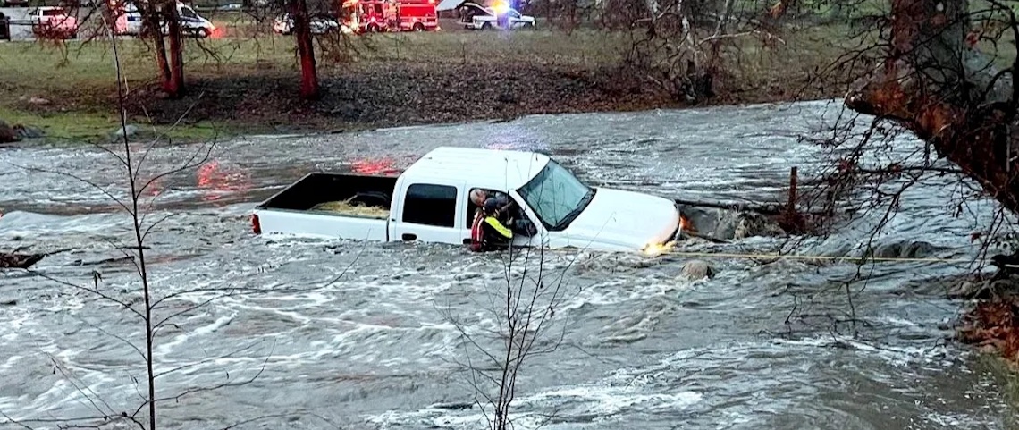 man trapped in truck