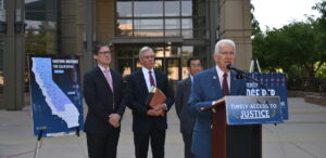jim costa speaks at a podium