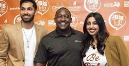 three people posting for a photo