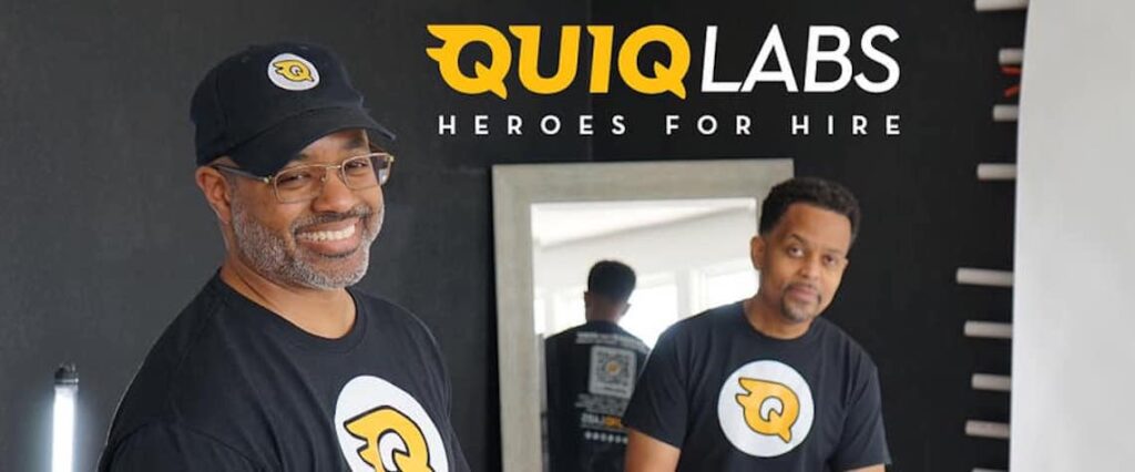 two men smiling side by side