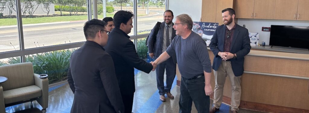 people meeting and shaking hands