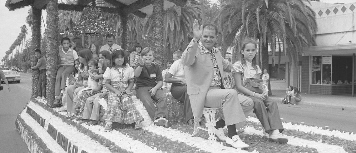 man and children on a float