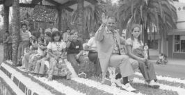 man and children on a float