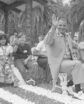 man and children on a float