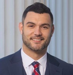 man in a tie smiling