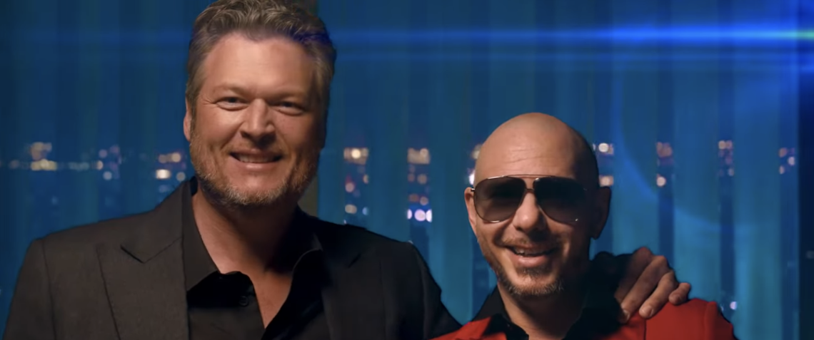 blake shelton and pitbull standing together