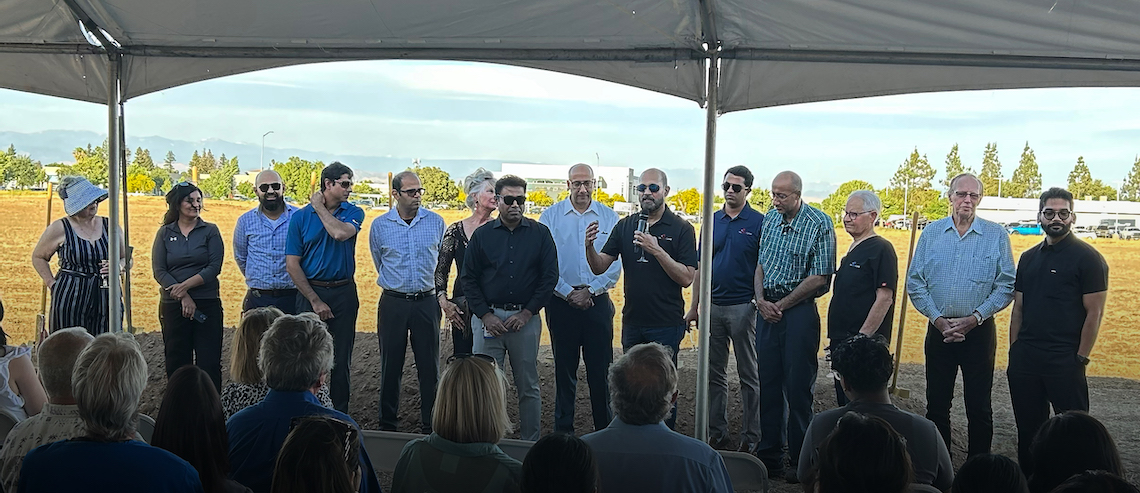 people gathered for a groundbreaking event