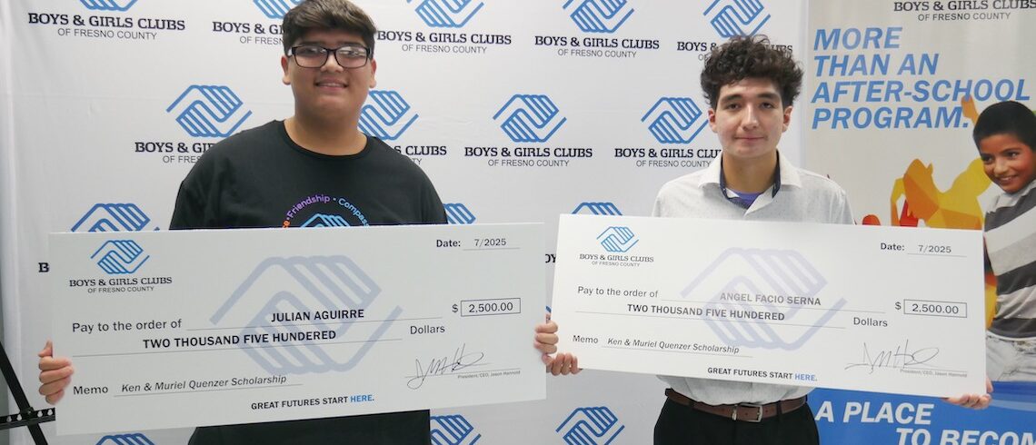 two boys with oversized check