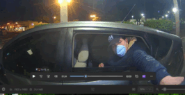 man allegedly attempting to break into an ATM to steal cash