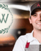 man with a restaurant logo