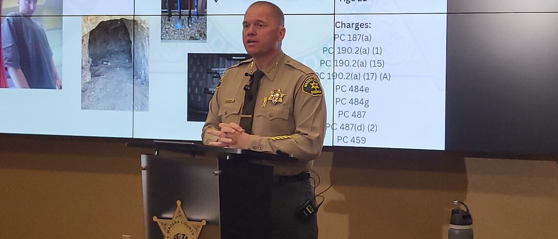 sheriff at a podium