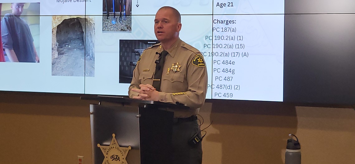 sheriff at a podium