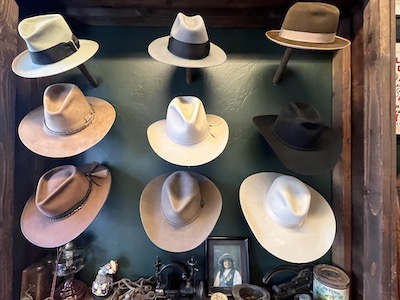 hats on a wall