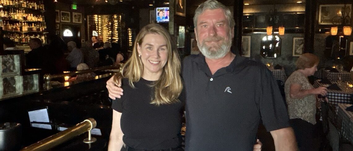 two people in a bar