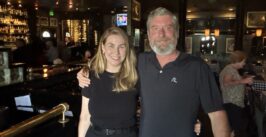 two people in a bar