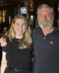 two people in a bar