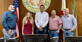 group of people on a city government dais