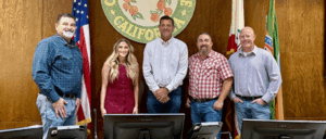 group of people on a city government dais