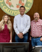 group of people on a city government dais