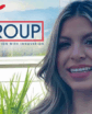 woman on a rooftop with a logo next to her head