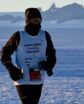 a man runs in sub-zero temperatures in an icy wasteland