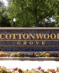 monument sign for an apartment complex called cottonwood grove