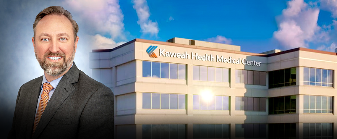 a man's portrait combined with a hospital building