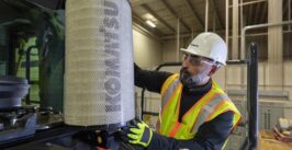 man working on a piece of heavy machinery