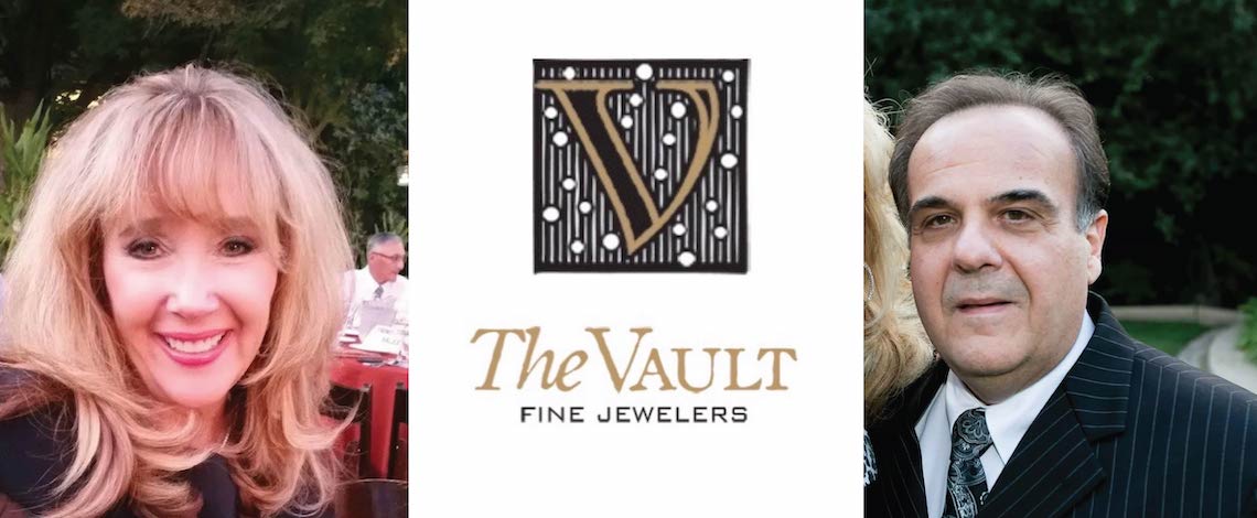 woman and man with a logo that says "the vault"