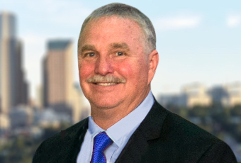 man in a suit smiling