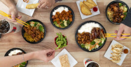 teriyaki spread of foods and a random ricke krispie treat.