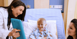 doctor consulting with young patient