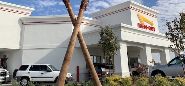 cars in a fast food parking lot