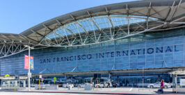 the front of an international airport that is modern