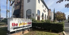 restaurant with sign