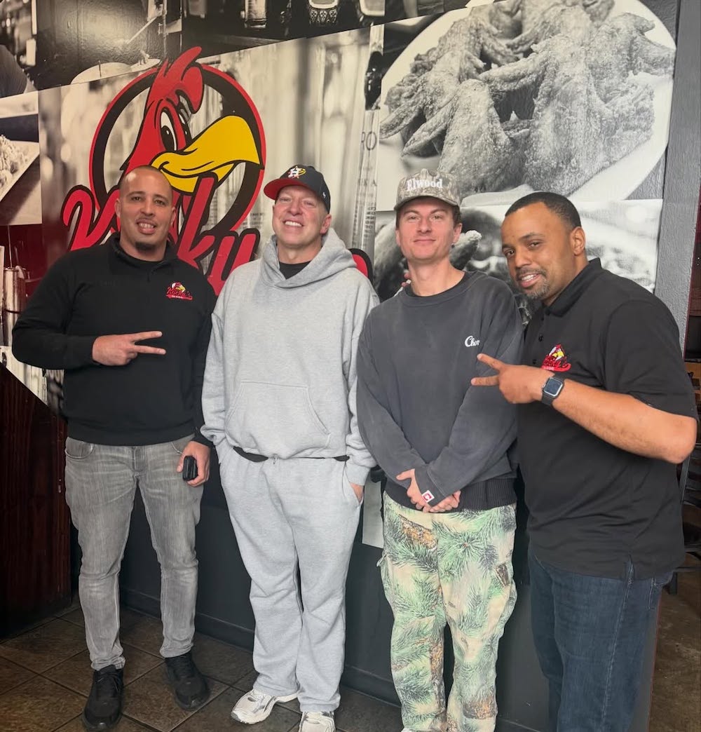 four guys take a selfie