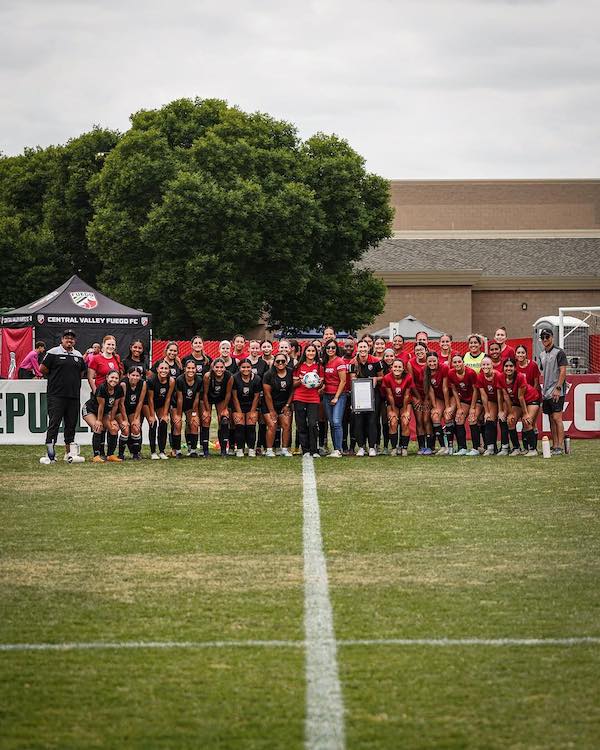 group photo on soccer pitch