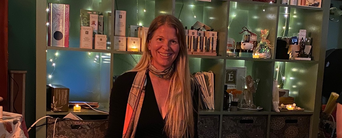 woman sitting in a darkened room