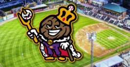 a steak mascot superimposed over a baseball field