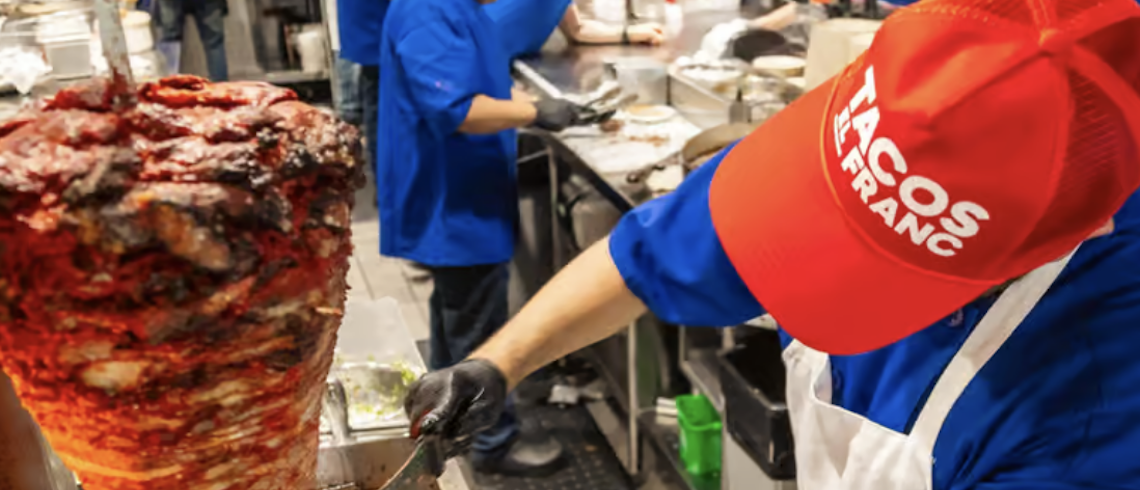 taco slicing from a vertical spit