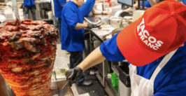 taco slicing from a vertical spit