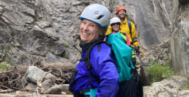 a woman mountain climbing