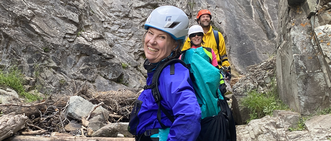 a woman mountain climbing