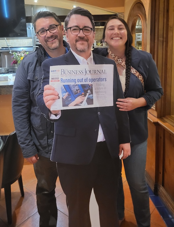 two people and a cardboard cutout