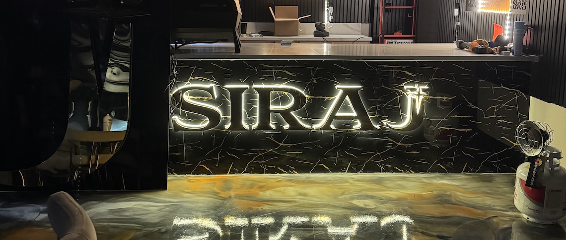 coffee shop counter in black and gold