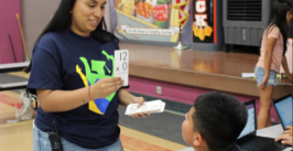 Teaching Fellow working with student