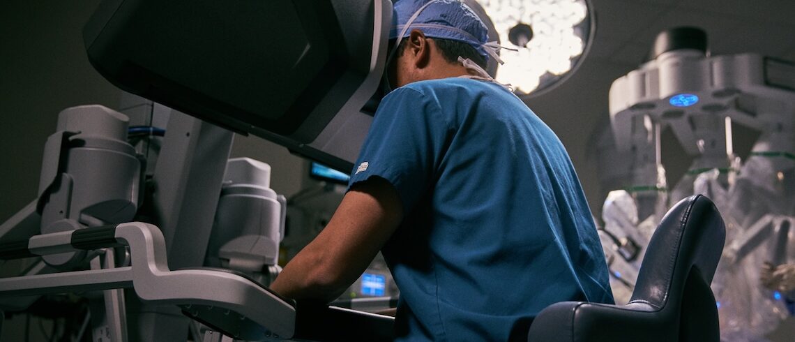 surgeon performing robotic surgery