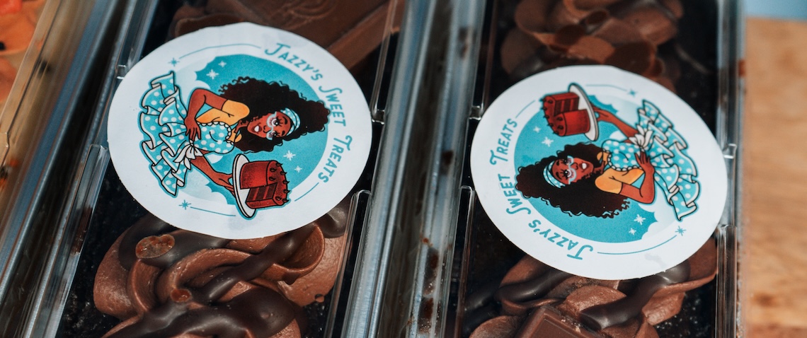 chocolate treats in a plastic container with a label "jazzy's sweat treats"