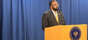 man at podium